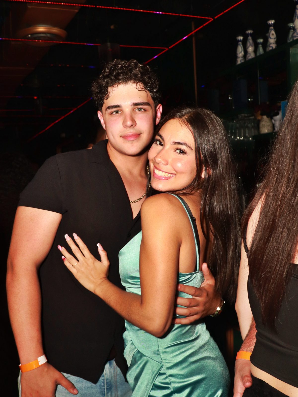 Friends posing together on a night out at Forget Me Not